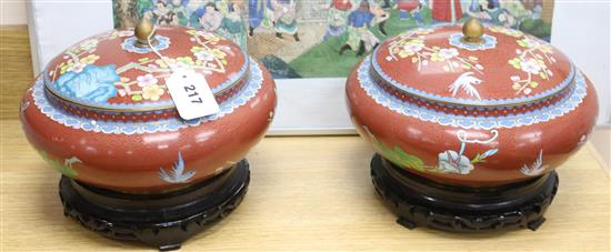 A pair of Chinese cloisonne enamel bowls and covers, wood stands diameter 17cm height 21cm